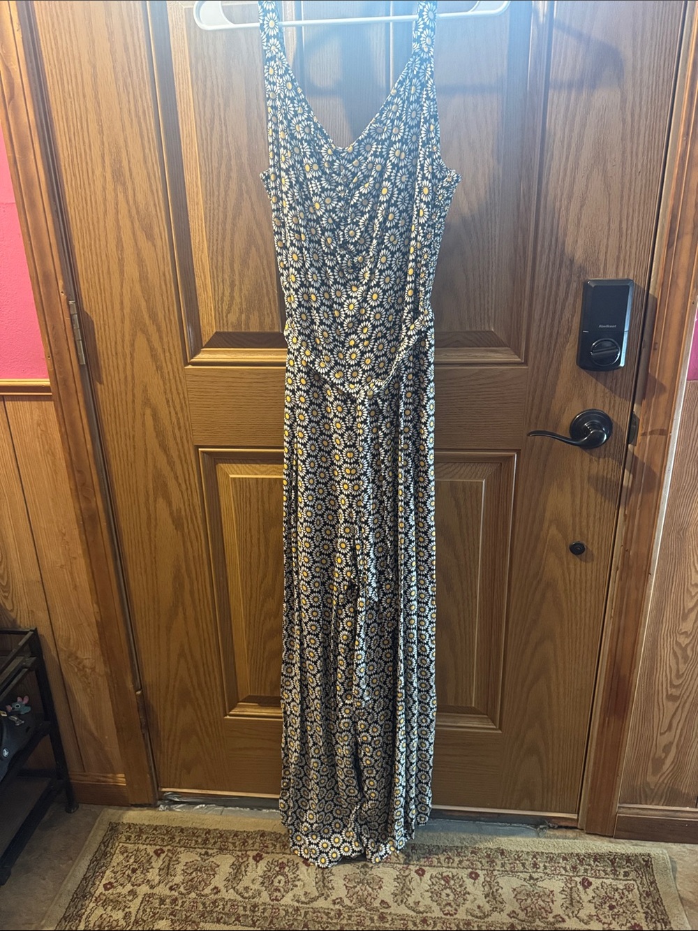 Sleeveless Floral Jumpsuit in Blk and Yellow 15” across there is elastic on back